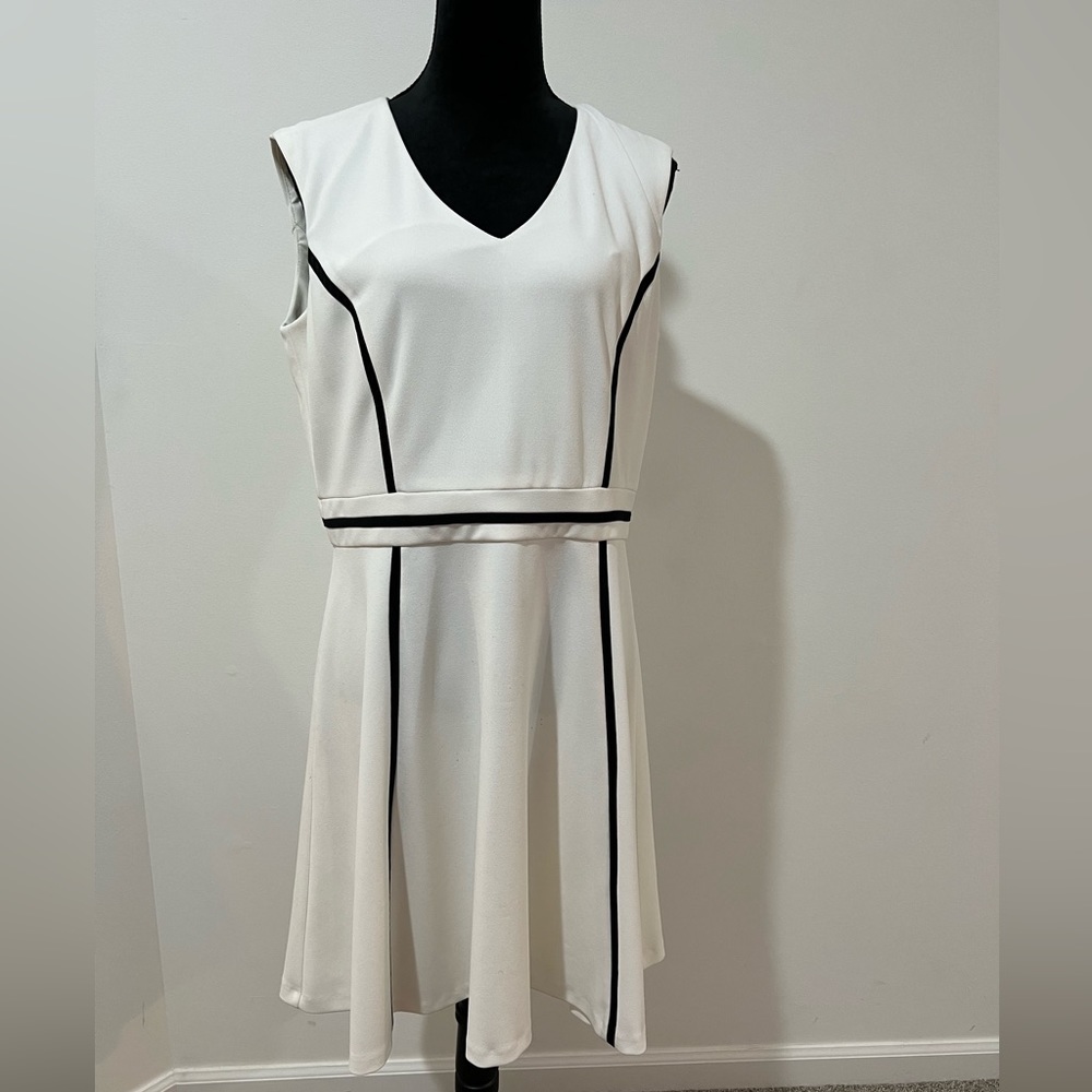 White trimmed in black dress